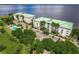 Aerial view of waterfront community, showcasing building and pool at 200 Harbor Walk Dr # 243, Punta Gorda, FL 33950