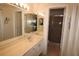 Bathroom with double vanity and shower at 255 Mission S Trl # J, Venice, FL 34285