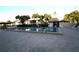 Community swimming pool with lounge chairs at 255 Mission S Trl # J, Venice, FL 34285