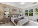 Spacious bedroom with plush bedding and large window at 1817 W Price Blvd, North Port, FL 34286