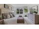 Main bedroom with king-size bed and dresser at 1817 W Price Blvd, North Port, FL 34286