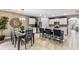 Open concept kitchen and dining area with modern lighting at 1817 W Price Blvd, North Port, FL 34286