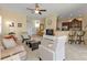 Open living room with views into kitchen and dining areas at 13064 Creekside Ln, Port Charlotte, FL 33953