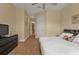 Bedroom with a king-size bed and access to a hallway at 13064 Creekside Ln, Port Charlotte, FL 33953