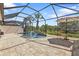 Relaxing pool area with covered patio and seating at 13064 Creekside Ln, Port Charlotte, FL 33953