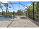 Enjoy this beautiful pool and spa with waterfall features at 13064 Creekside Ln, Port Charlotte, FL 33953