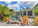 Inviting pool area with a relaxing patio and lush landscaping at 1285 Casper St, Port Charlotte, FL 33953