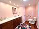 Clean bathroom with updated fixtures and a convenient walk-in shower at 743 Tangerine Woods Blvd, Englewood, FL 34223