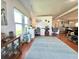 Bright home office with wood floors, two desks, and natural light at 743 Tangerine Woods Blvd, Englewood, FL 34223