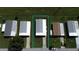Aerial view of single-Gathering home in a residential neighborhood at 743 Tangerine Woods Blvd, Englewood, FL 34223