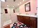 Updated bathroom with a walk-in shower and a modern vanity at 743 Tangerine Woods Blvd, Englewood, FL 34223