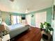 Serene bedroom with a comfortable bed, and plenty of closet space at 743 Tangerine Woods Blvd, Englewood, FL 34223