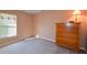 Small bedroom with dresser and window at 552 Rose Apple Cir, Port Charlotte, FL 33954