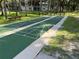 Two shuffleboard courts in a community at 552 Rose Apple Cir, Port Charlotte, FL 33954