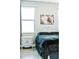 Bedroom with a bed and nightstand at 5148 Guava Ter, Port Charlotte, FL 33981