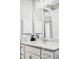 Bathroom with double vanity and mirror at 5148 Guava Ter, Port Charlotte, FL 33981
