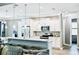 Modern kitchen with white cabinets, granite countertops, and stainless steel appliances at 5148 Guava Ter, Port Charlotte, FL 33981