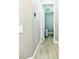 Hallway with door to another room at 5148 Guava Ter, Port Charlotte, FL 33981