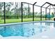 Relaxing screened pool with backyard views at 5148 Guava Ter, Port Charlotte, FL 33981