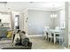 Bright dining room with a rustic farmhouse table and six chairs at 5148 Guava Ter, Port Charlotte, FL 33981