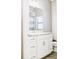 Bathroom with vanity and large mirror at 5148 Guava Ter, Port Charlotte, FL 33981