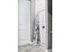 Bathroom with white subway tile and floral shower curtain at 5148 Guava Ter, Port Charlotte, FL 33981