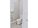 Clean bathroom with toilet and tiled floor at 5148 Guava Ter, Port Charlotte, FL 33981