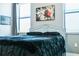Bedroom with bed, window, and artwork at 5148 Guava Ter, Port Charlotte, FL 33981