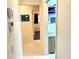 Clean hallway with access to bedrooms and laundry room at 181 N Waterway Nw Dr, Port Charlotte, FL 33952