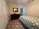 Cozy bedroom with double bed and mirrored dresser at 829 Pineland Ave, Venice, FL 34285