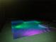 Inviting pool with colorful night lighting at 829 Pineland Ave, Venice, FL 34285