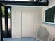Exterior storage closet near the patio at 829 Pineland Ave, Venice, FL 34285