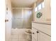 Clean bathroom with a shower/tub combo, vanity, and tiled floor at 1515 Forrest Nelson Blvd # H108, Port Charlotte, FL 33952