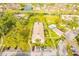 Aerial view highlighting condo building near pool and parking lot at 1515 Forrest Nelson Blvd # H108, Port Charlotte, FL 33952