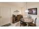 A well-lit dining area with a round table and four chairs at 1515 Forrest Nelson Blvd # H108, Port Charlotte, FL 33952