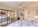 Main bedroom with mirrored closet and ensuite bathroom access at 1515 Forrest Nelson Blvd # H108, Port Charlotte, FL 33952