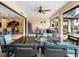 Outdoor dining area with a view of the kitchen and pool at 15378 Taurus Cir, Port Charlotte, FL 33981