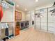 Convenient laundry room with washer, dryer, and built-in storage at 15378 Taurus Cir, Port Charlotte, FL 33981