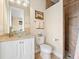 Bathroom with a glass sink, tiled shower, and granite countertop at 15378 Taurus Cir, Port Charlotte, FL 33981