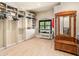 Bright laundry room with ample storage and shelving at 15378 Taurus Cir, Port Charlotte, FL 33981