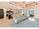 Open concept living space with a view of kitchen and access to the pool at 15378 Taurus Cir, Port Charlotte, FL 33981