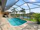 Relaxing screened pool and patio area at 15378 Taurus Cir, Port Charlotte, FL 33981