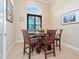 Charming dining area with a round table and six chairs at 15378 Taurus Cir, Port Charlotte, FL 33981