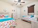 Guest bedroom with twin beds and coastal decor at 15378 Taurus Cir, Port Charlotte, FL 33981