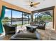 Relaxing covered patio with comfortable seating at 15378 Taurus Cir, Port Charlotte, FL 33981