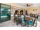 Outdoor kitchen with stainless steel appliances and seating area at 15378 Taurus Cir, Port Charlotte, FL 33981