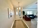 Spacious entryway with a view of the living room and front door at 181 N Waterway Nw Dr, Port Charlotte, FL 33952