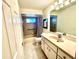 Bathroom with tub, shower, and vanity at 181 N Waterway Nw Dr, Port Charlotte, FL 33952