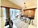 Kitchen nook with glass-top table and seating for two at 181 N Waterway Nw Dr, Port Charlotte, FL 33952