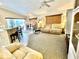 Open concept living room and kitchen, with ample seating and natural light at 181 N Waterway Nw Dr, Port Charlotte, FL 33952